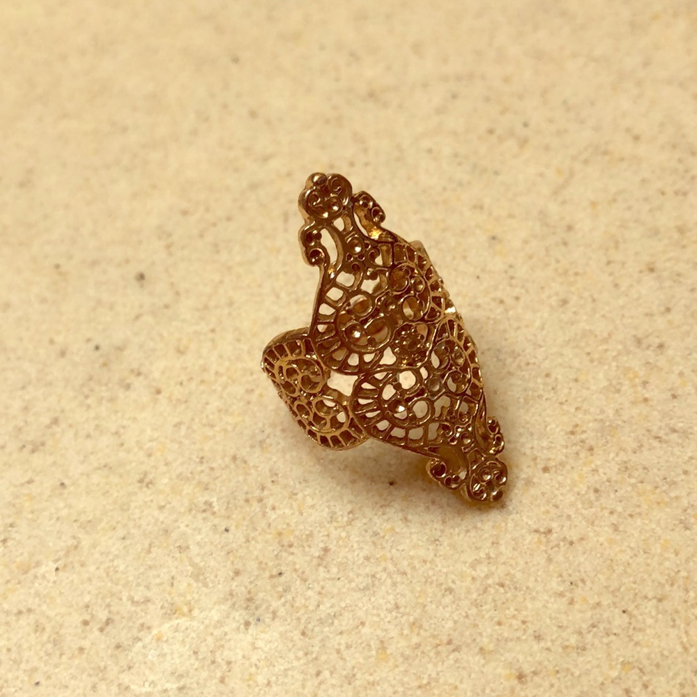 Funky design, gold colored ring